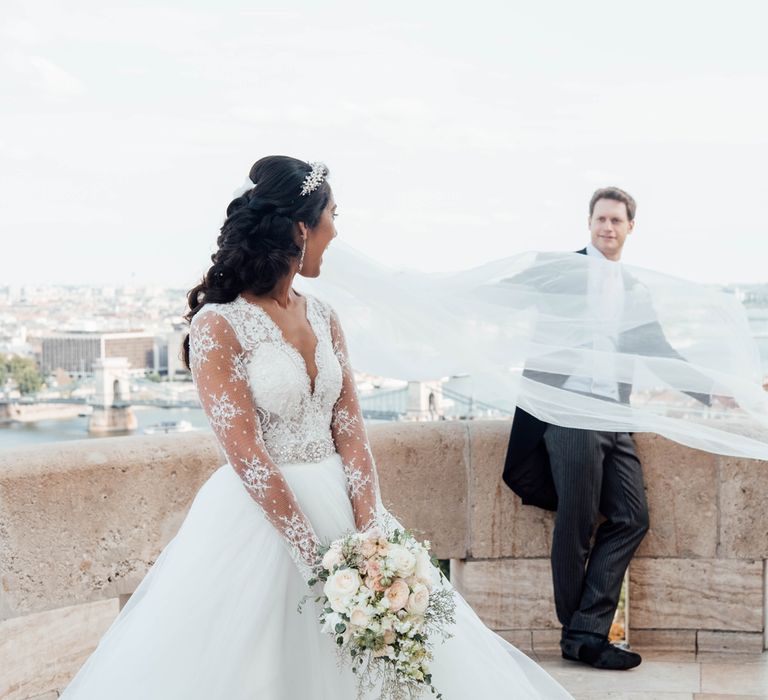 Bride in Pergola Rosa Clara Princess Wedding Dress and Groom in Traditional Morning Suit