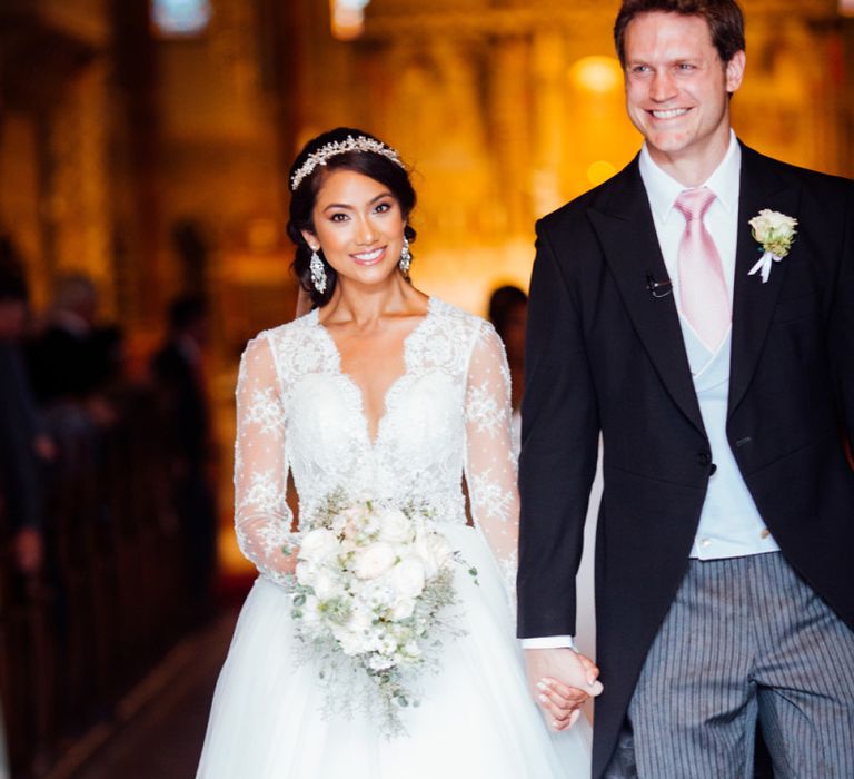 Bride in Pergola Rosa Clara Princess Wedding Dress Exiting the Church Wedding Ceremony with Her Groom in a Morning Suit