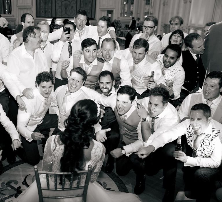 Bride in Pergola Rosa Clara Princess Wedding Dress Surrounded by The Groomsmen on the Dancefloor