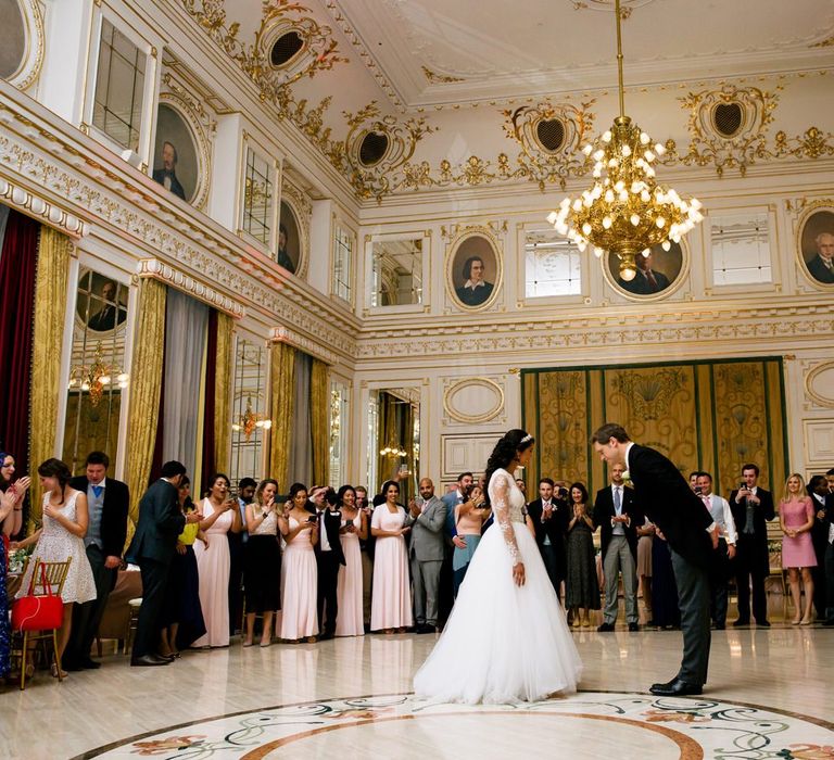 First Dance with Bride in Pergola Rosa Clara Princess Wedding Dress and Groom in Traditional Morning Suit