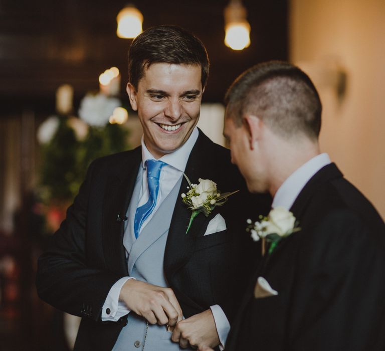 Groom in traditional morning suit