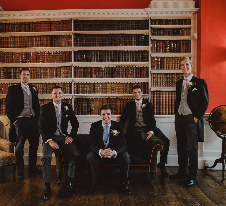 Groomsmen portrait in the Library of Shropshire wedding venue, Iscoyd Park