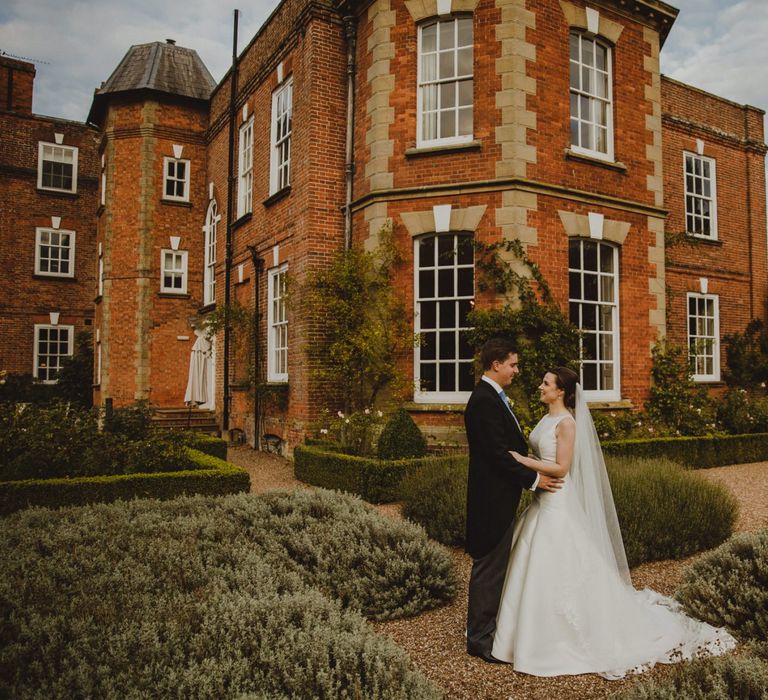 Bride and groom portrait outside Iscoyd Park