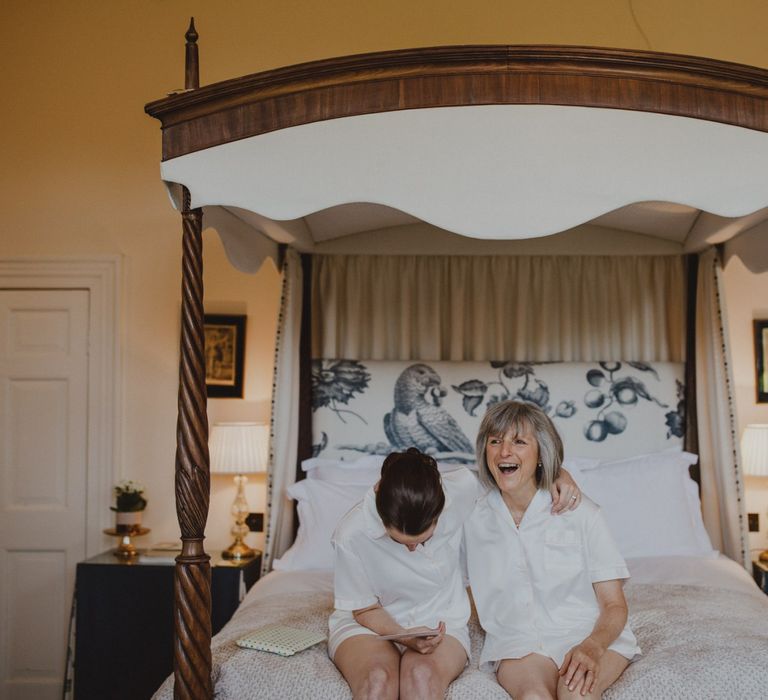 Mother of the bride and daughter on wedding morning