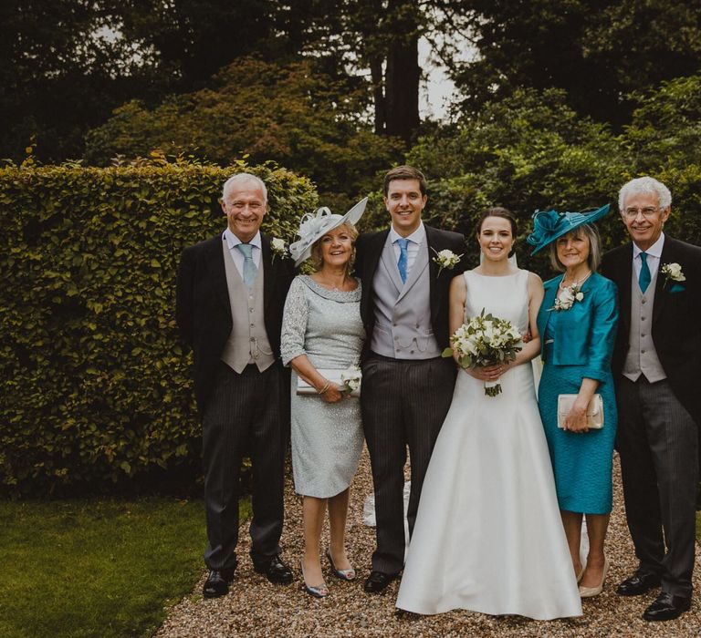 Bride and groom portrait with parents