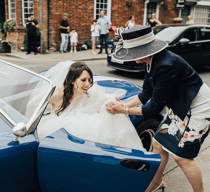 Bride arrives in wedding transport