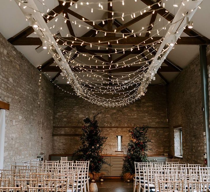 Fairy light canopy for barn wedding