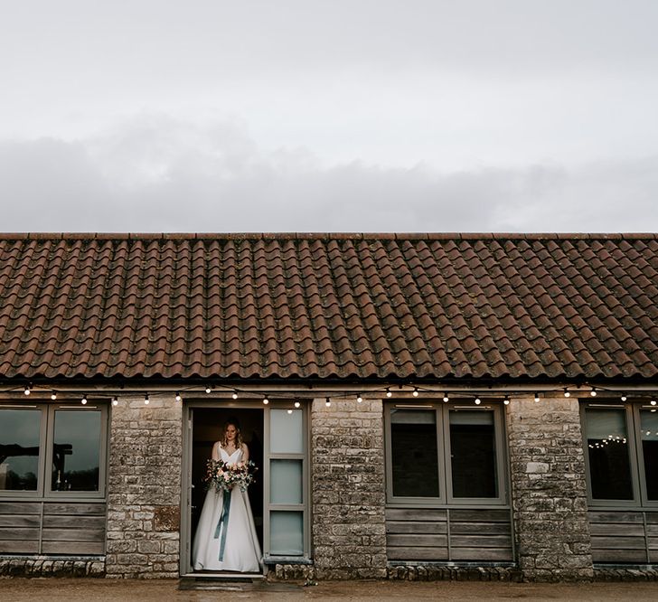 Bride makes her way to the wedding ceremony at Bristol venue