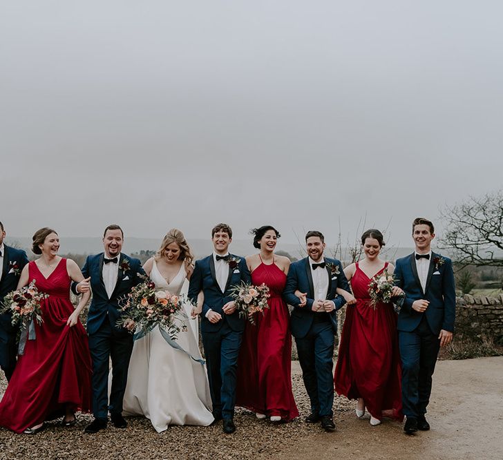 Red bridesmaid dresses for Winter wedding with unplugged wedding sign