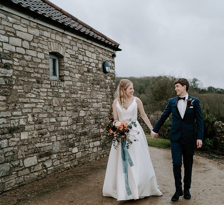 Bride and groom at Folly Farm wedding venue in Bristol