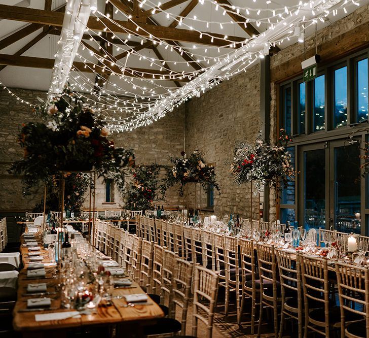 Barn wedding with fairy light canopy