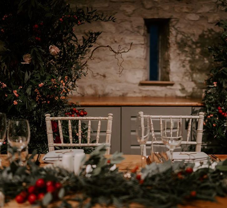 Wedding table decor with foliage table runner