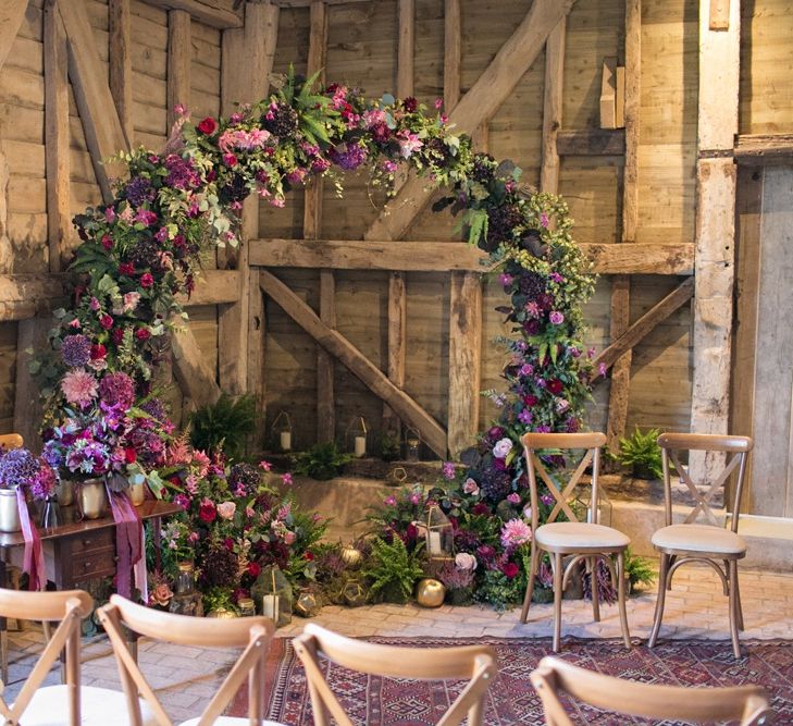 Purple, Plum, Aubergine and Berry Flower Moon Gate in a Rustic Barn