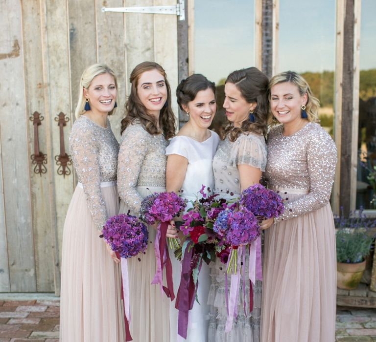 Bridal Party with Bridesmaids in Needle &amp; Thread Dresses and Bride in Jesus Peiro Wedding Dress