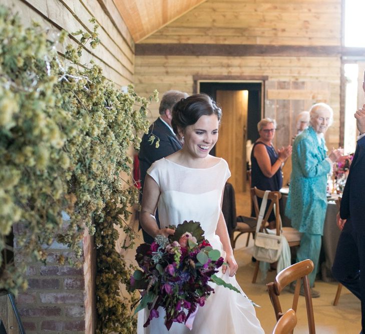 Bride Entering The Wedding Breakfast in a Jesus Peiro Wedding Dress