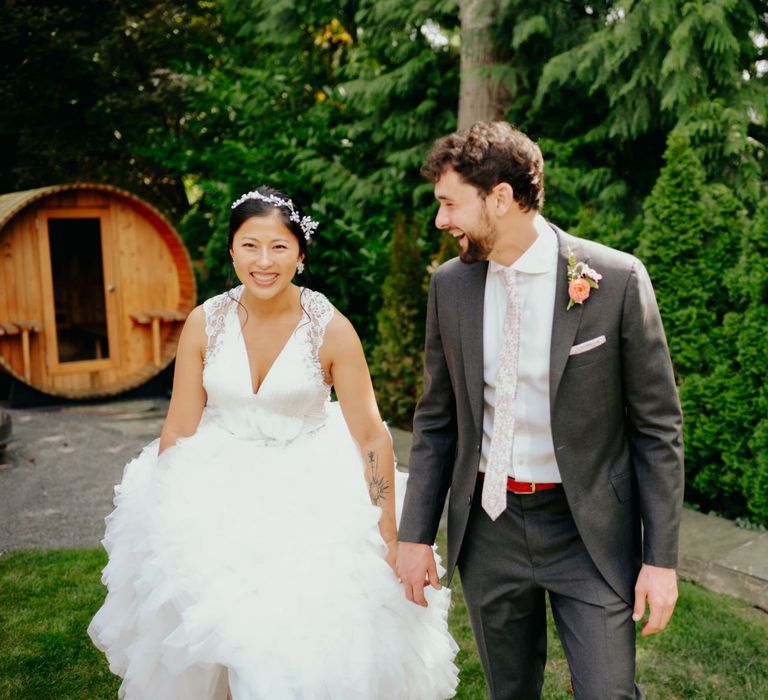 Happy bride and groom during first look portraits