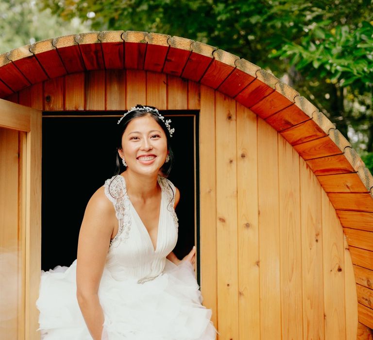 Bride in preloved wedding dress and detachable skirt