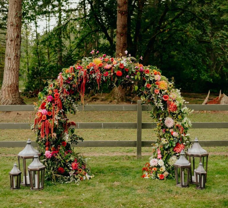 Flower arch, moon gate, altar with lanterns