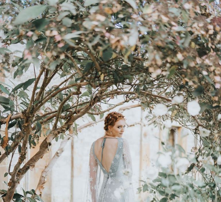 Blue wedding dress with white embroidery celestial details