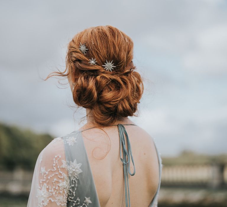 pinned wedding hair with celestial star hair clips