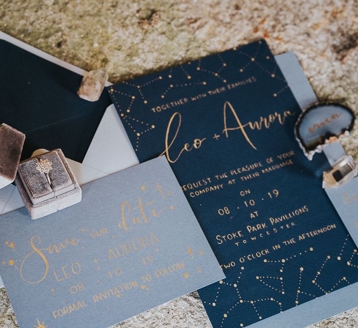 Blue and gold wedding invitation and ring box