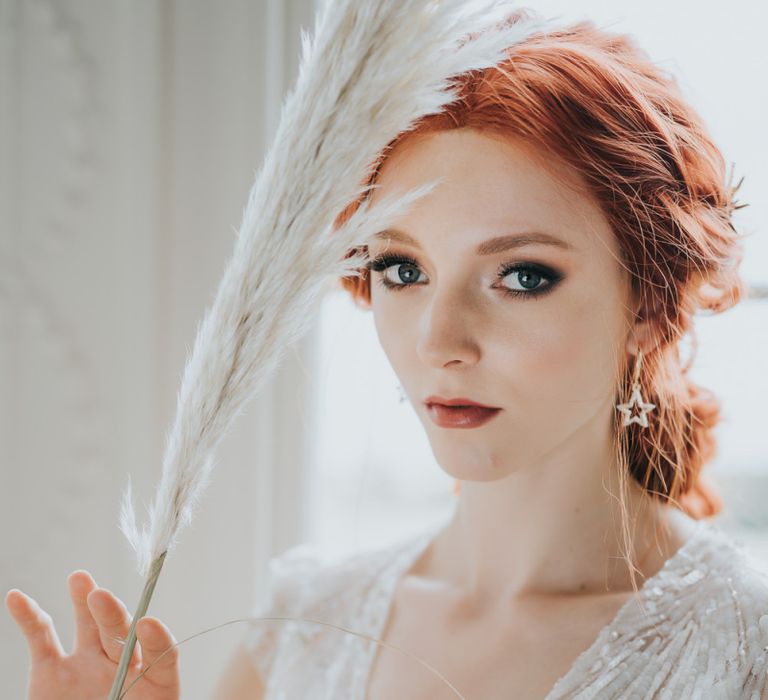 Natural bridal makeup and star earrings