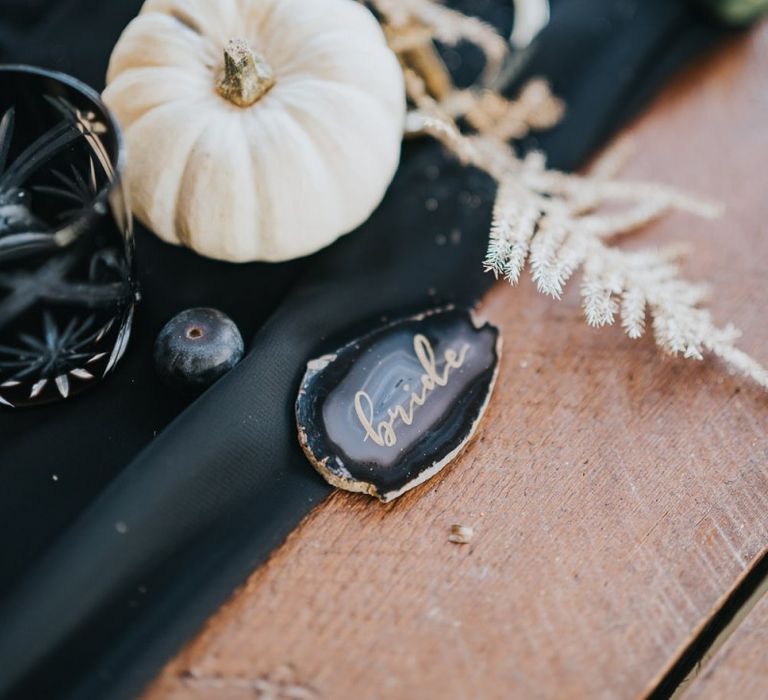 White pumpkin and geode name place setting