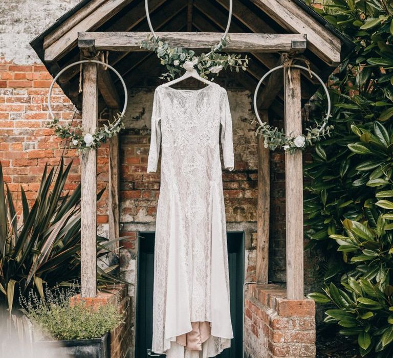 Grace Loves Lace wedding dress with hoop wedding decor