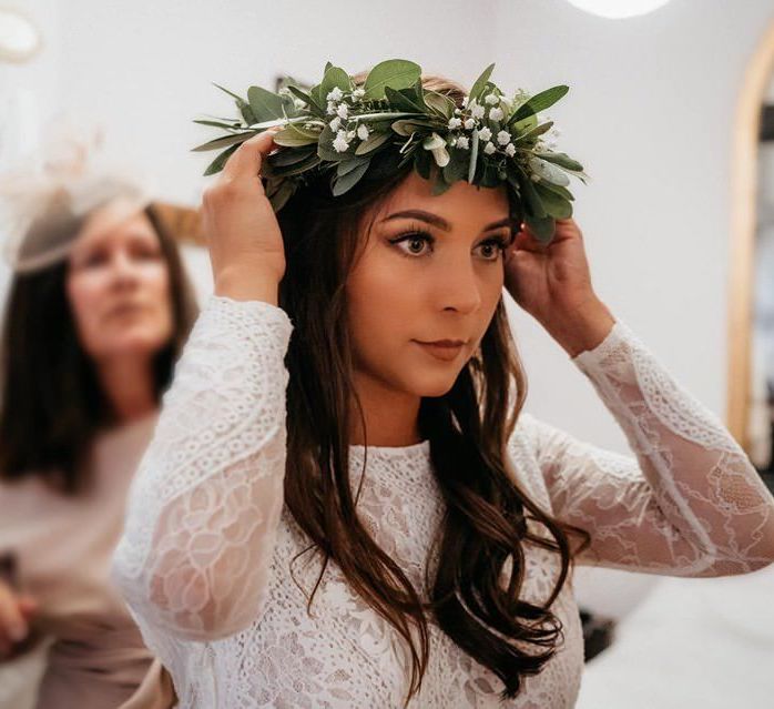 Foliage crown with lace bride dress