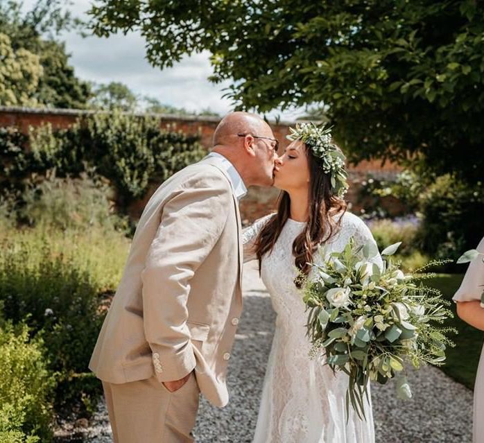 Bride kisses father before ceremony