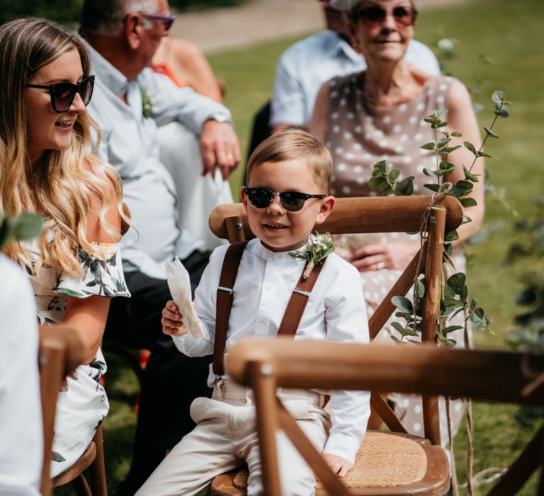 Cute kids at wedding with donut wall and macrame wedding decor