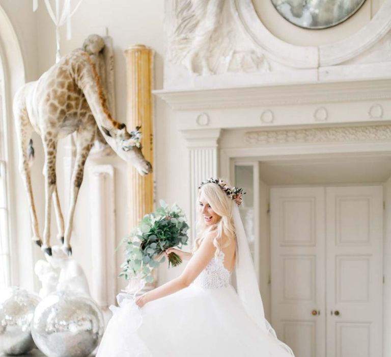 Lace bride dress with bouquet and glitter ball decoration