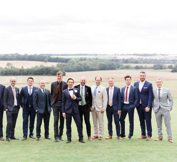 Groom with guests at Aynhoe Park wedding venue