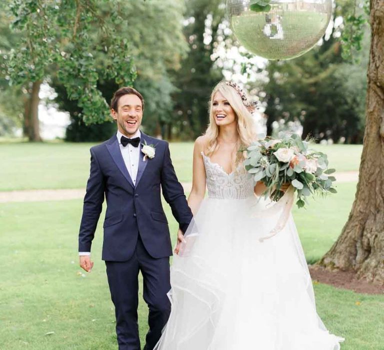 Bride and groom at Aynhoe Park wedding venue for whimsical wedding