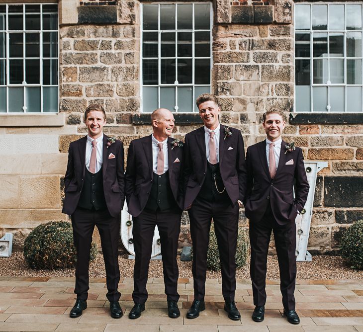 Groomsmen in Tailor Me Moss Bros. Three-piece Suits with Horseshoe Waistcoat