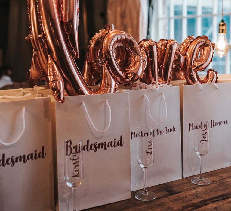 Love Foil Balloon on Top of Bridal Party Gift Bags