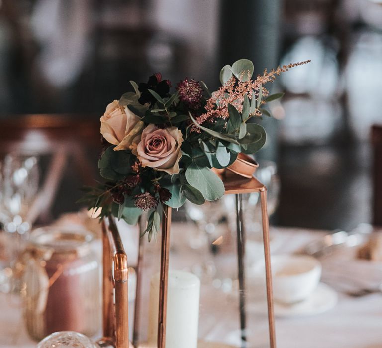 Copper Centrepiece Wedding Reception Decor at Industrial Venue The West Mill in Derbyshire