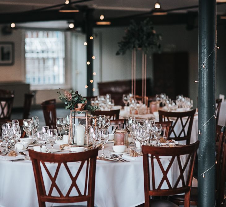 Copper Centrepiece Wedding Reception Decor at Industrial Venue The West Mill in Derbyshire