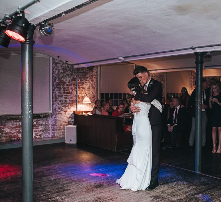 First Dance with Bride in Pronovias Dracma Bardot Wedding Dress and Groom in Tailor Me Moss Bros. Suit