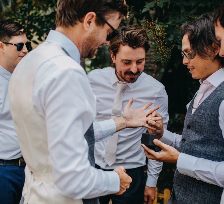 Groomsmen Enjoying a Beer Before the Wedding Ceremony