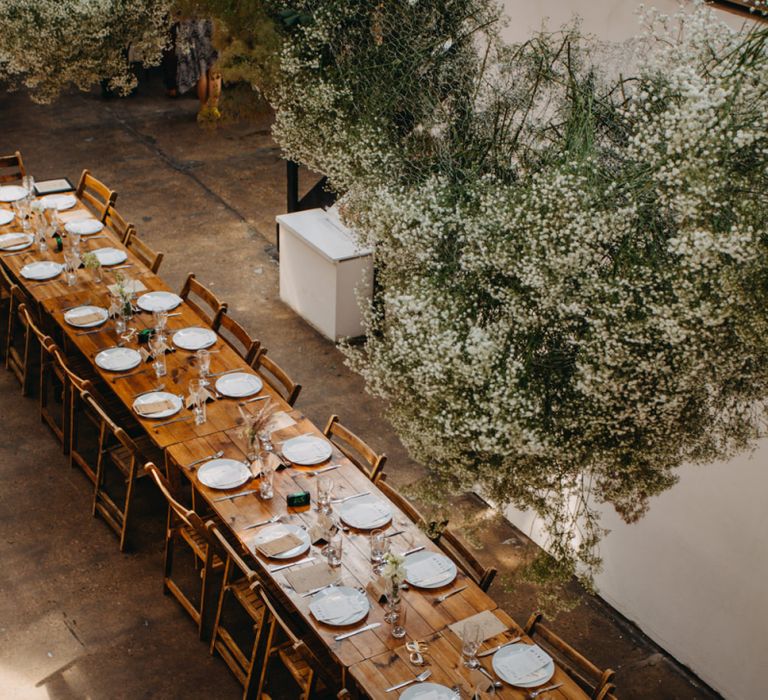 Flower Cloud Installation and Wooden Reception Tables