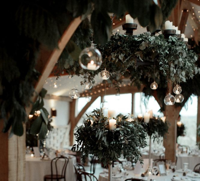 Cripps Barn wedding Reception Decor with Hanging Votives and Candelabra Centrepiece