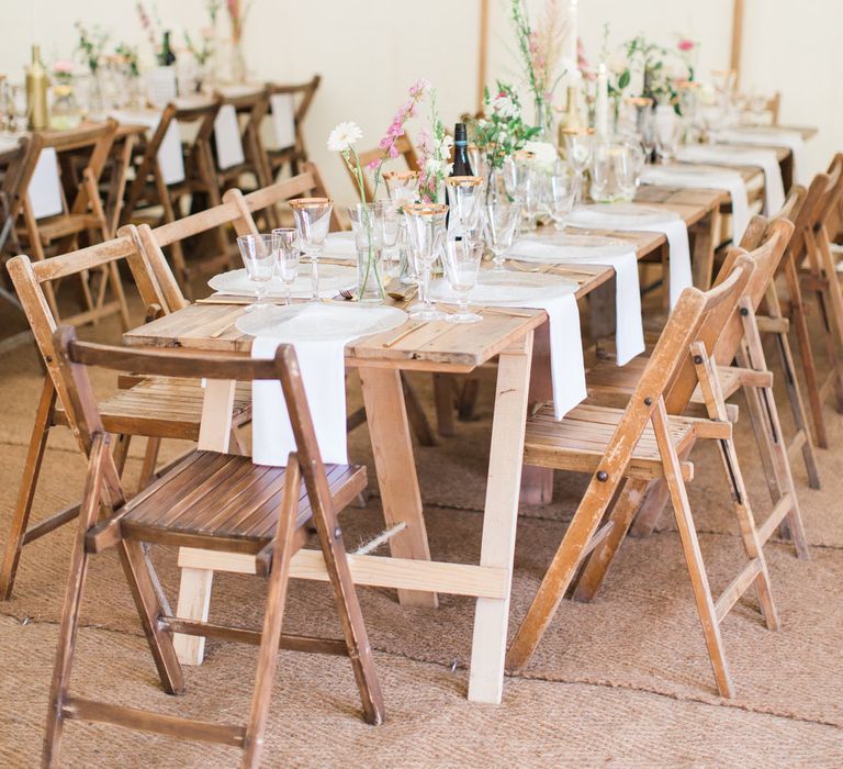 Wooden Trestle Tables For Marquee Wedding // Needle &amp; Thread Bridesmaids Dresses For A Pink And Mint At Home Marquee With Fine Art Photography From Amy Fanton Photography