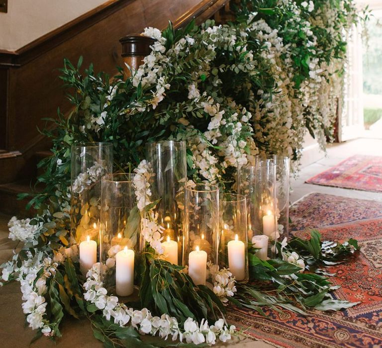 White Flower and Foliage Staircase Flowers with Candles