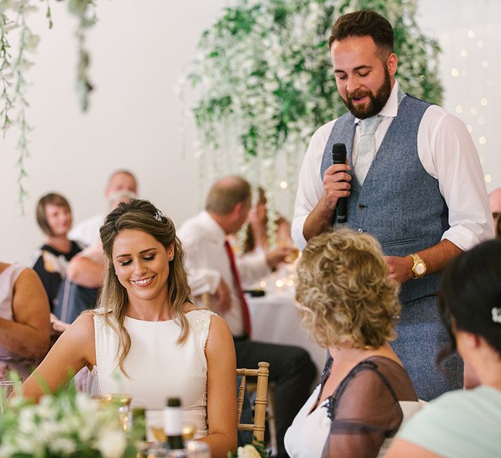 Groom in Grey Wool Waistcoat Giving His Wedding Speech