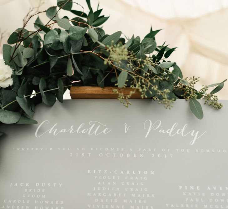 Grey Table Plan with Greenery Garland | Elegant Grey, Green Marquee Wedding at Tullyveery House N. Ireland with Decor &amp; Styling by Mood Events | The Lou's Photography | Soul &amp; Rise Film