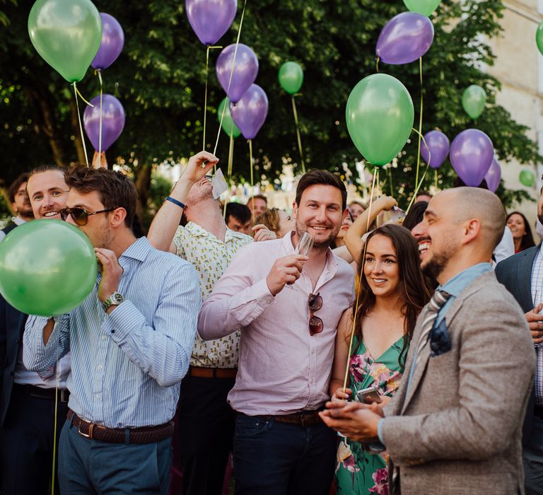 Balloon Release For Wedding // Secret Garden Party Inspired Wedding France Bride In Large Faux Floral Crown And Glitter Station With Groom In Floral Print Suit &amp; Images From The Shannons