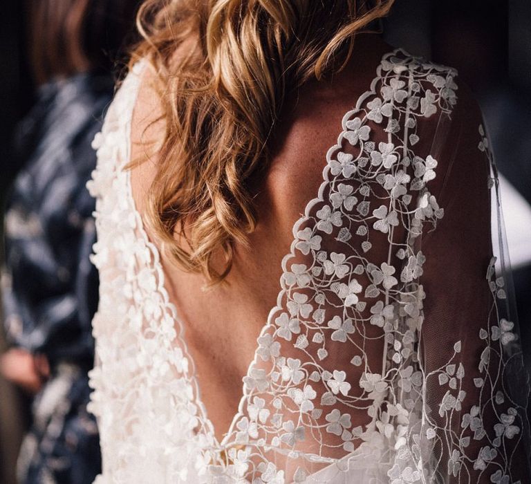 Appliqué wedding dress with hair down