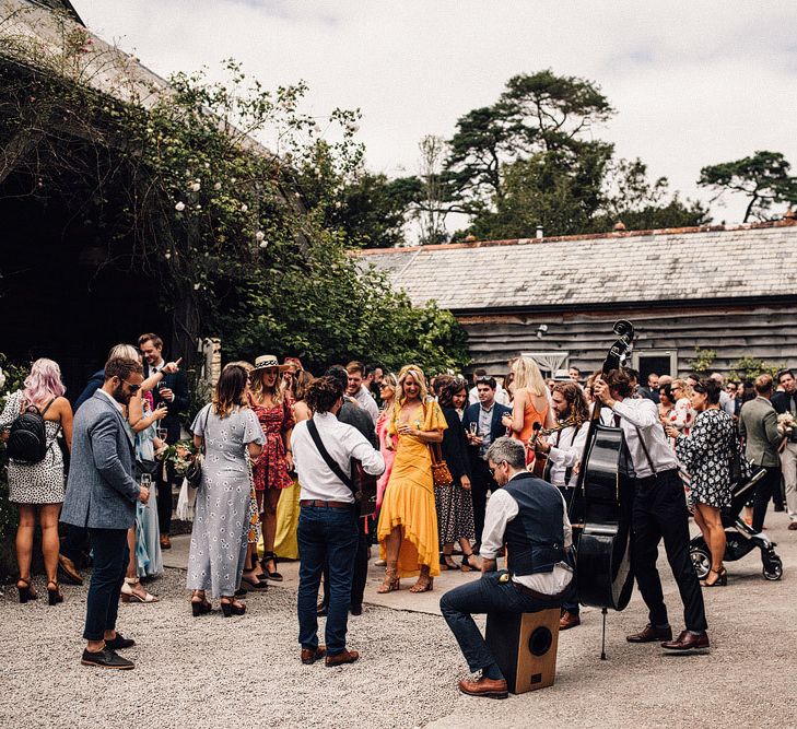 Guests enjoy drinks outside