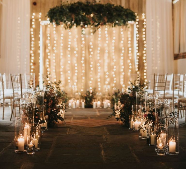 Healing Manor wedding ceremony with fairy light backdrop